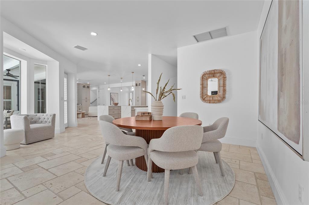 1826 Boyce Street Sarasota, FL 34239 - Photo 25 of 98 a view of a dining room with furniture and wooden floor