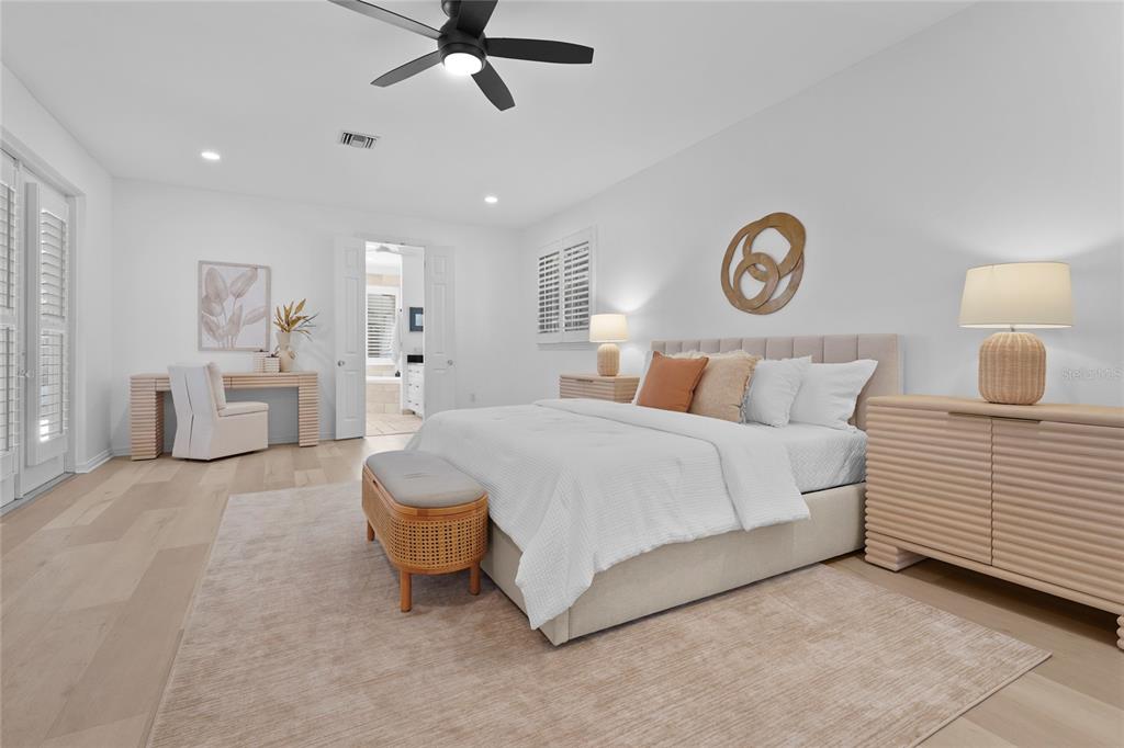 1826 Boyce Street Sarasota, FL 34239 - Photo 30 of 98 a bedroom with a bed and cabinets