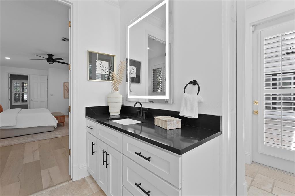 1826 Boyce Street Sarasota, FL 34239 - Photo 35 of 98 a kitchen with granite countertop a stove and a sink