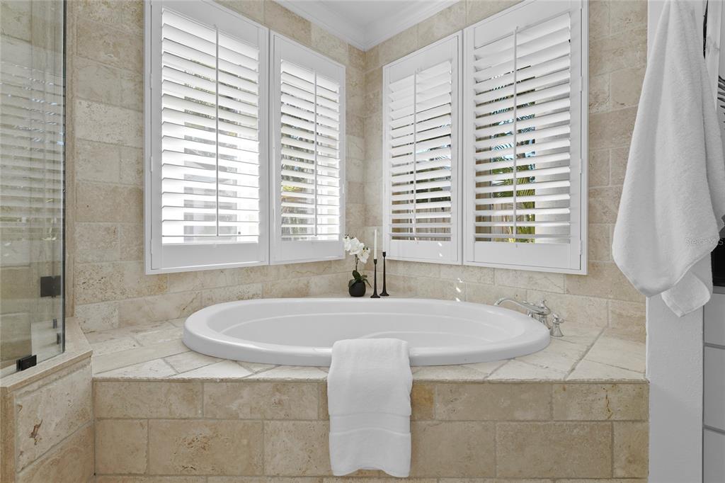 1826 Boyce Street Sarasota, FL 34239 - Photo 37 of 98 a bath tub sitting in a bathroom next to a window