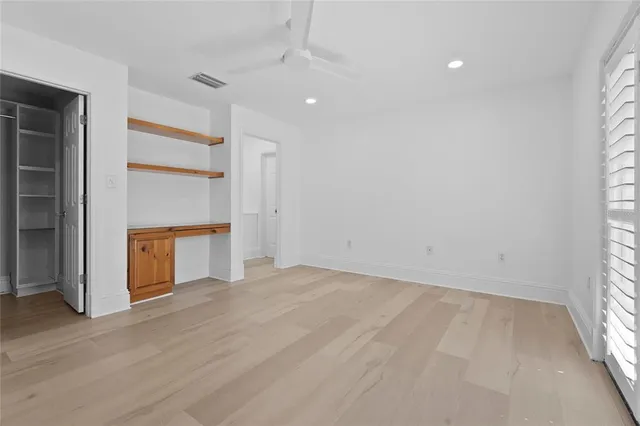 a view of a house with a tree