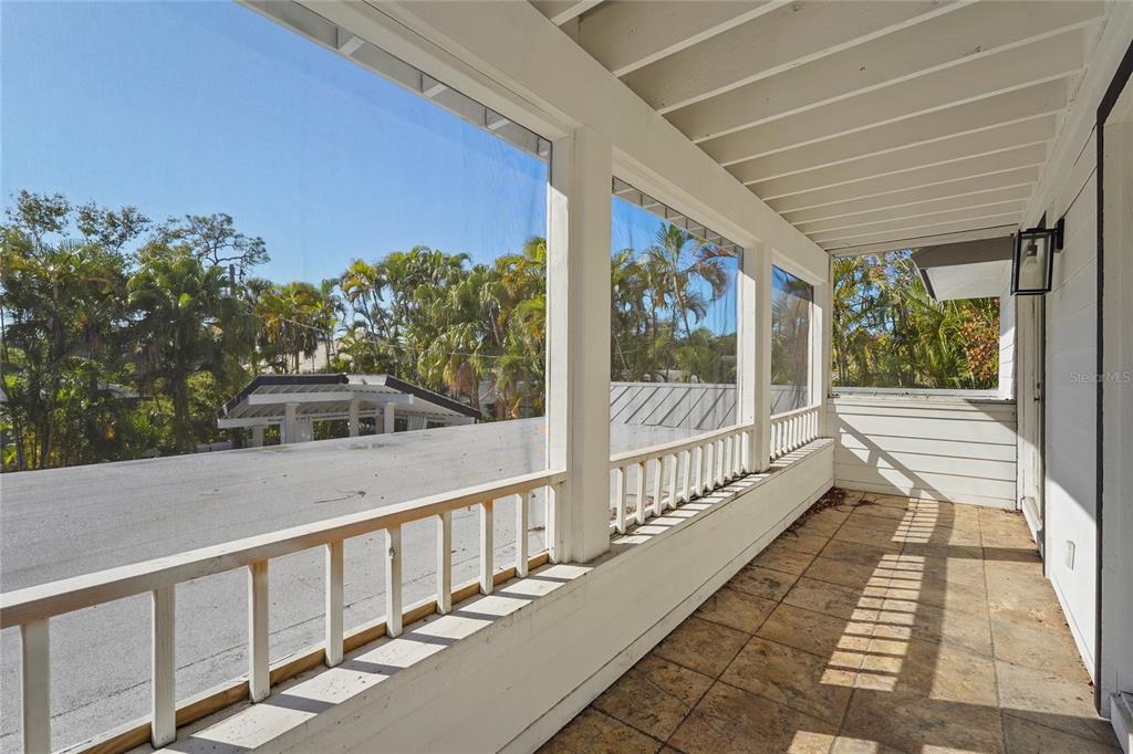 1826 Boyce Street Sarasota, FL 34239 - Photo 65 of 98 a view of a balcony with wooden floor and outdoor space