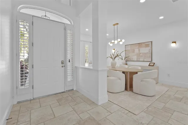 a large bathroom with a double vanity sink and a mirror