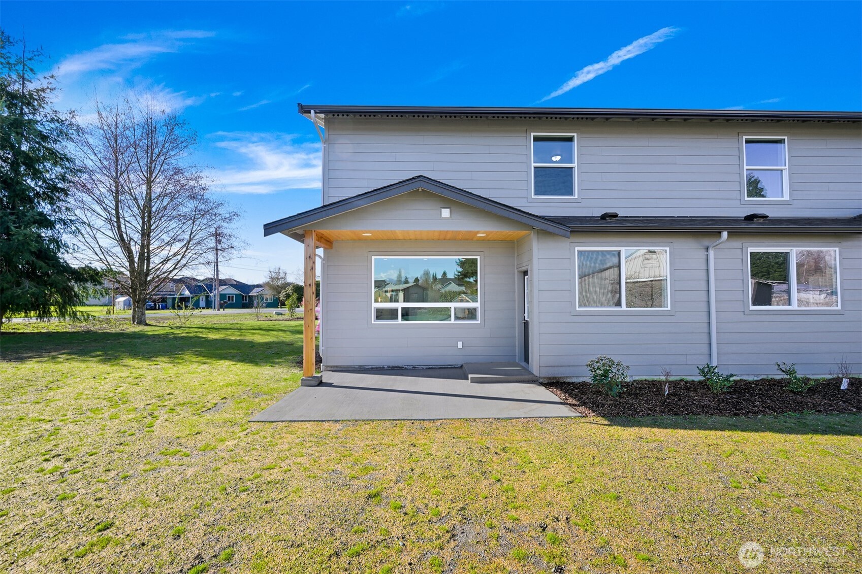 710 A F & S Grade Road, Unit B Sedro-Woolley, WA 98284 - Photo 31 of 38 a front view of a house with a yard
