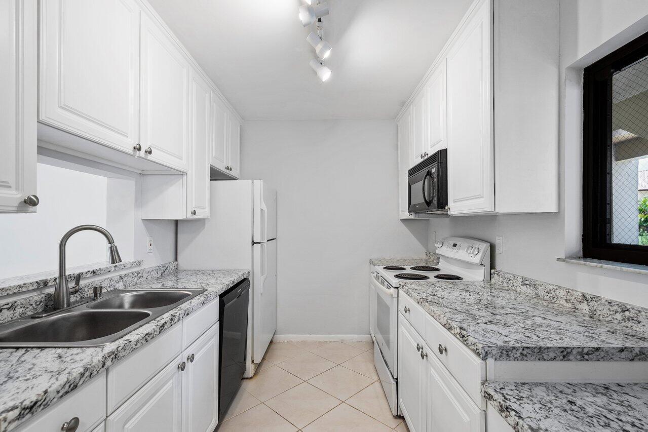 150 Northwest 70th Street, Unit 104 Boca Raton, FL 33487 - Photo 8 of 27 008-150Northwest70thStreet-BocaRaton-FL-