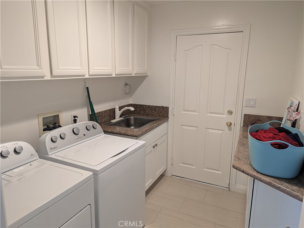 18536 Vantage Pointe Drive Rowland Heights, CA 91748 - Photo 18 of 34 a utility room with dryer and washer