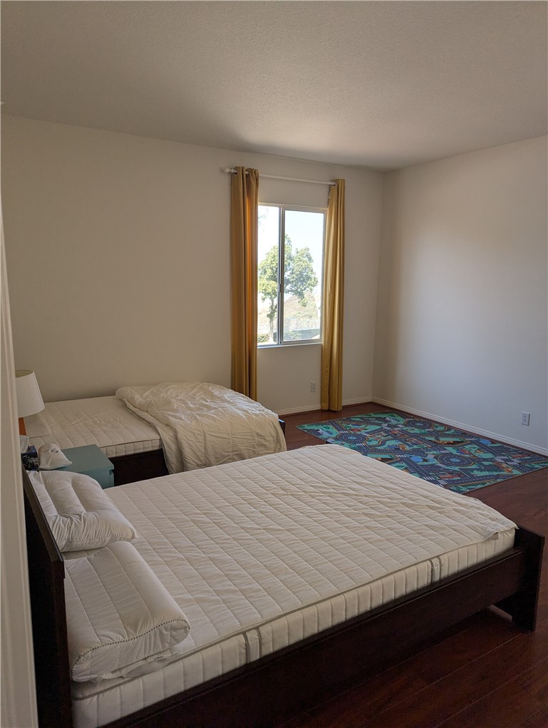 18536 Vantage Pointe Drive Rowland Heights, CA 91748 - Photo 21 of 34 a bedroom with a bed and window
