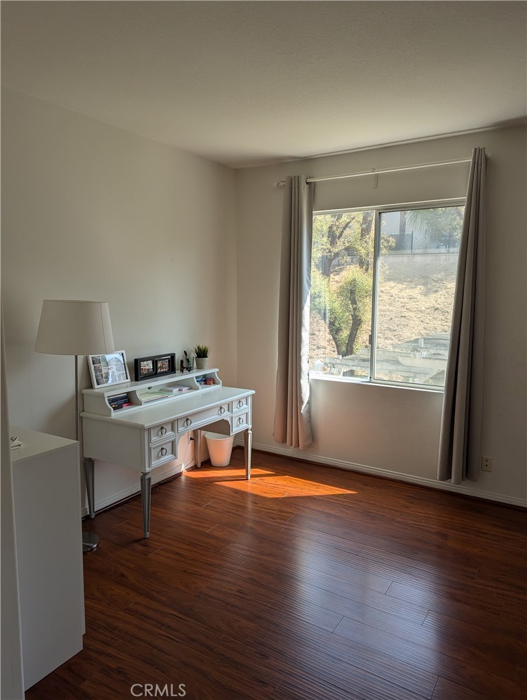 18536 Vantage Pointe Drive Rowland Heights, CA 91748 - Photo 25 of 34 a workspace with wooden floor and a window