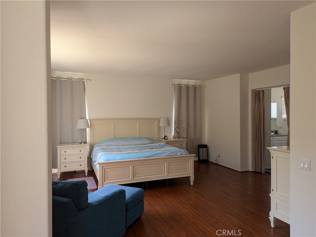 18536 Vantage Pointe Drive Rowland Heights, CA 91748 - Photo 27 of 34 a bedroom with a bed and a mirror