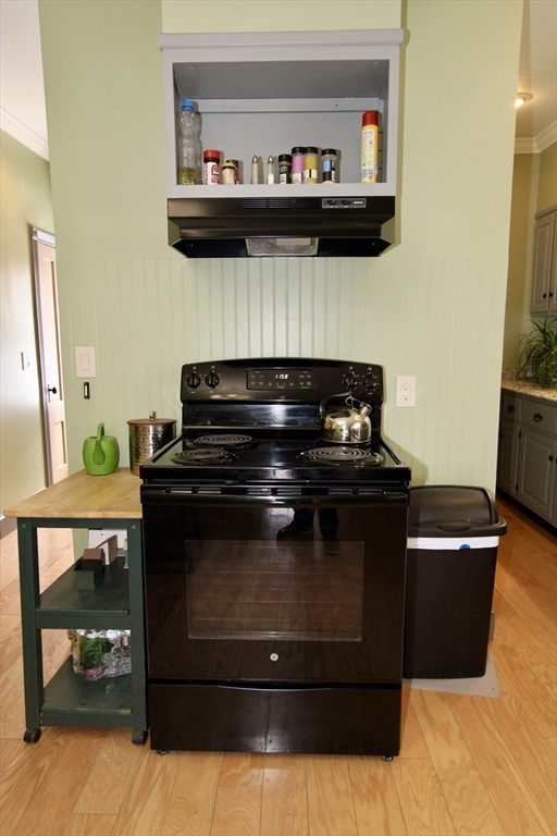 18 South Stowell Street Worcester, MA 01604 - Photo 4 of 16 a stove top oven sitting inside of a kitchen