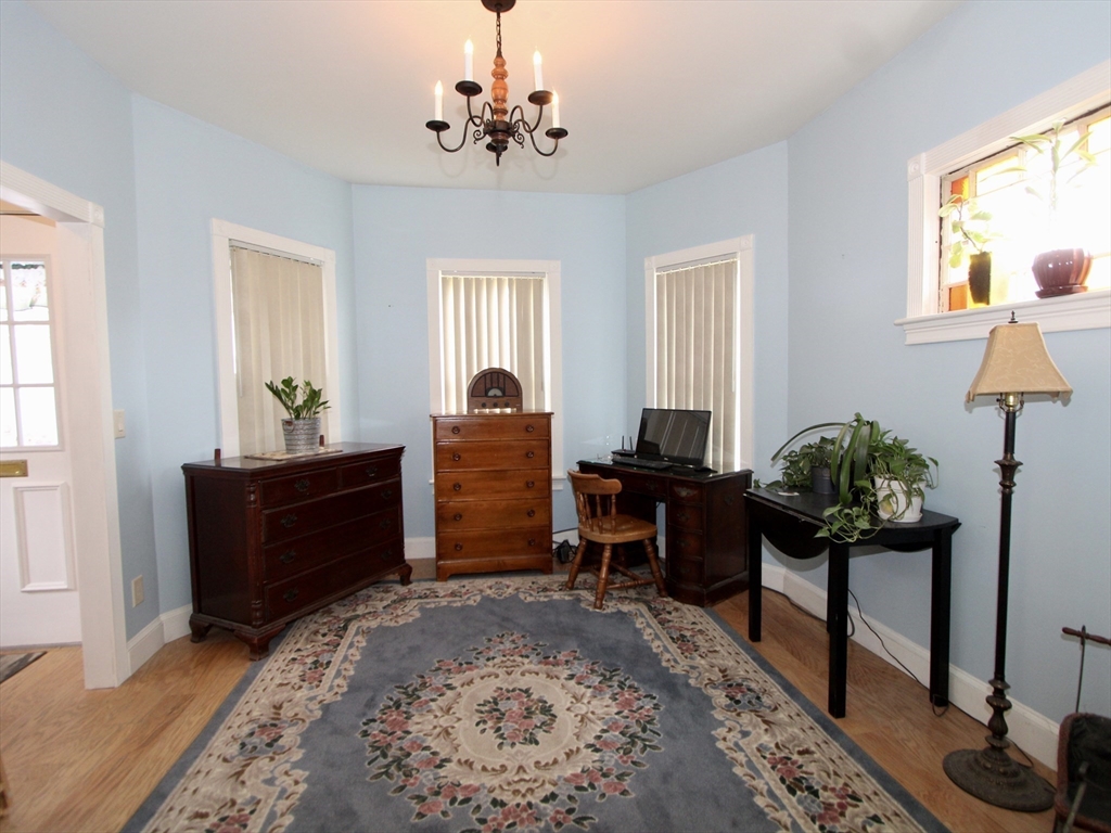 18 South Stowell Street Worcester, MA 01604 - Photo 7 of 16 a living room with furniture and a window