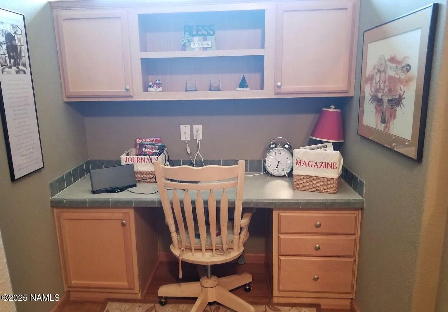12970 Doyle Road Flagstaff, AZ 86004 - Photo 13 of 26 a room with a table chairs and cabinets