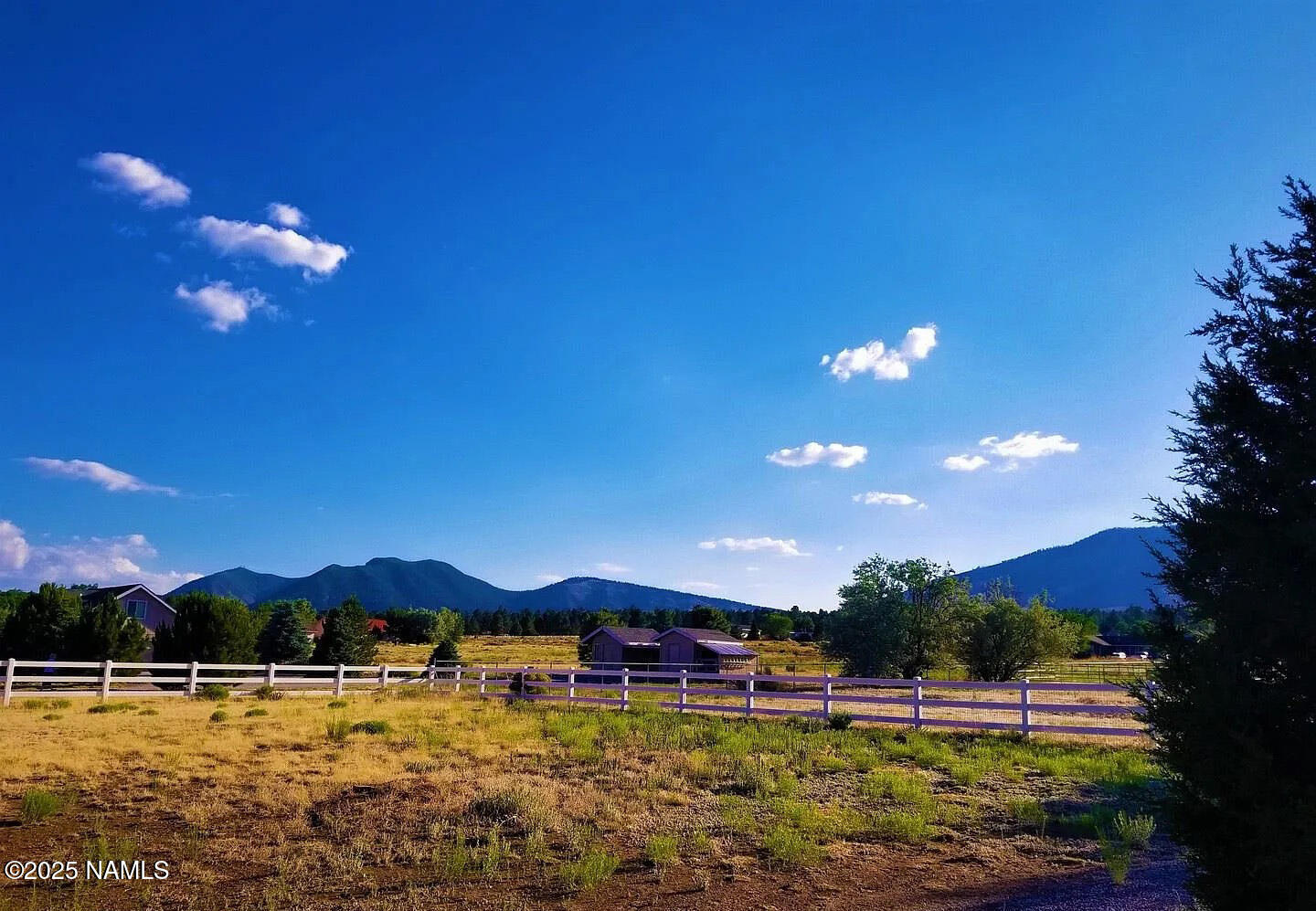12970 Doyle Road Flagstaff, AZ 86004 - Photo 16 of 26 a view of an ocean with a mountain view