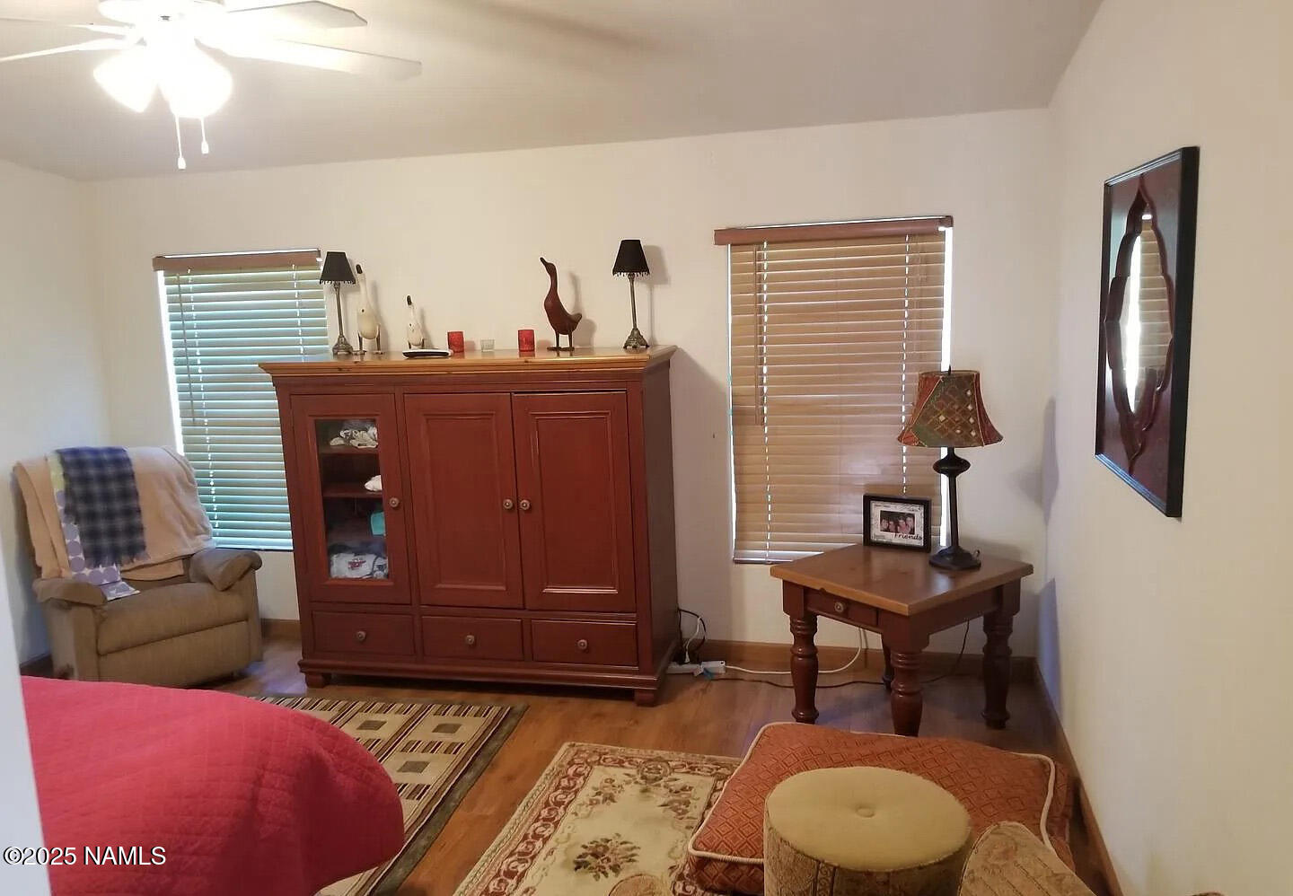 12970 Doyle Road Flagstaff, AZ 86004 - Photo 20 of 26 a living room with furniture and a rug