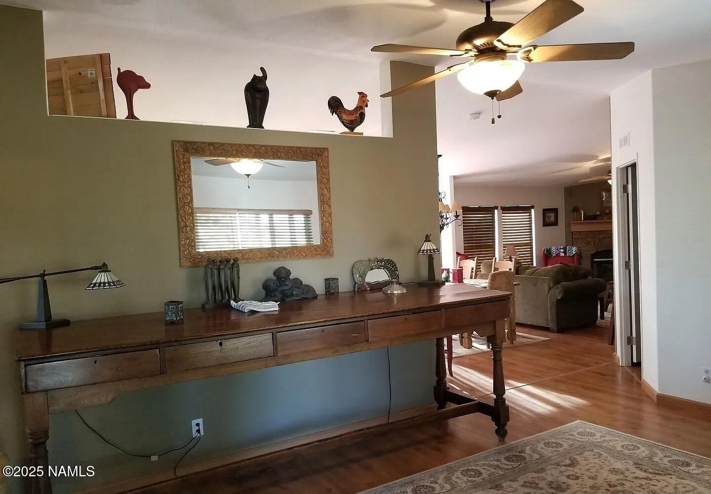 12970 Doyle Road Flagstaff, AZ 86004 - Photo 10 of 26 a room with a table chairs and a chandelier