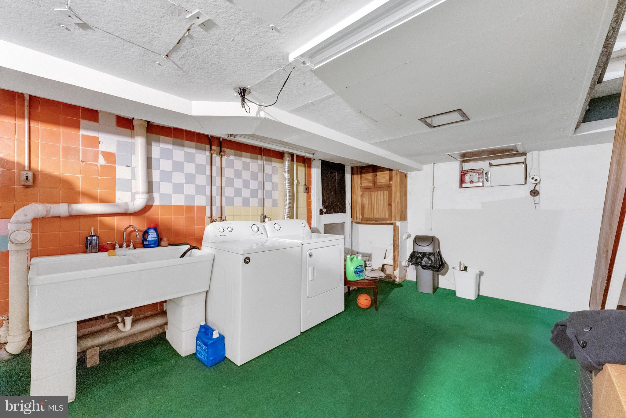 152 Division Street Trenton, NJ 08611 - Photo 22 of 24 a room with furniture a rug toys and a large window