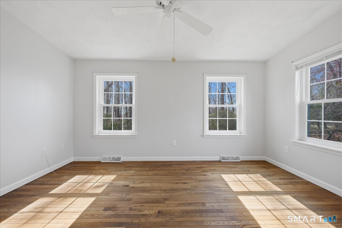 25 Heather Brook Road Montville, CT 06382 - Photo 19 of 39 an empty room with windows