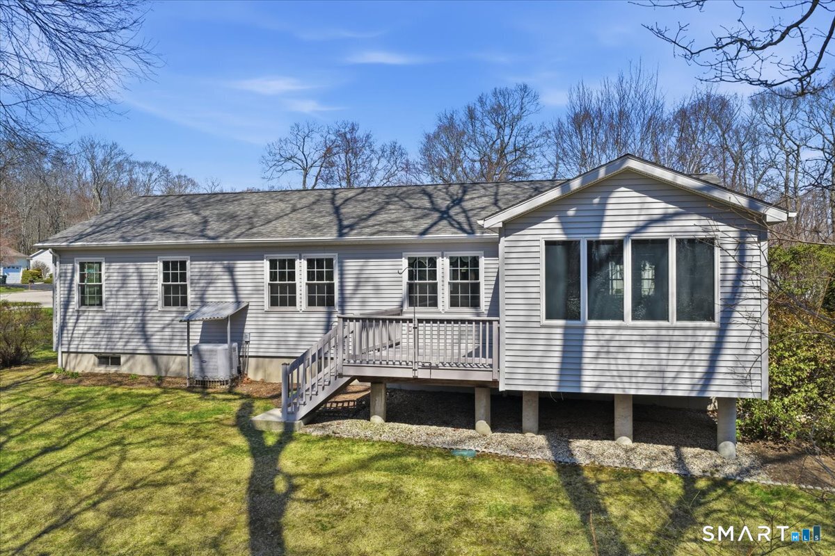 25 Heather Brook Road Montville, CT 06382 - Photo 25 of 39 a front view of a house with a yard