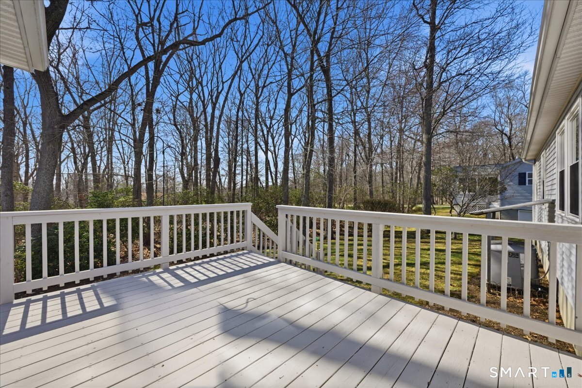 25 Heather Brook Road Montville, CT 06382 - Photo 31 of 39 a view of balcony with wooden floor and fence