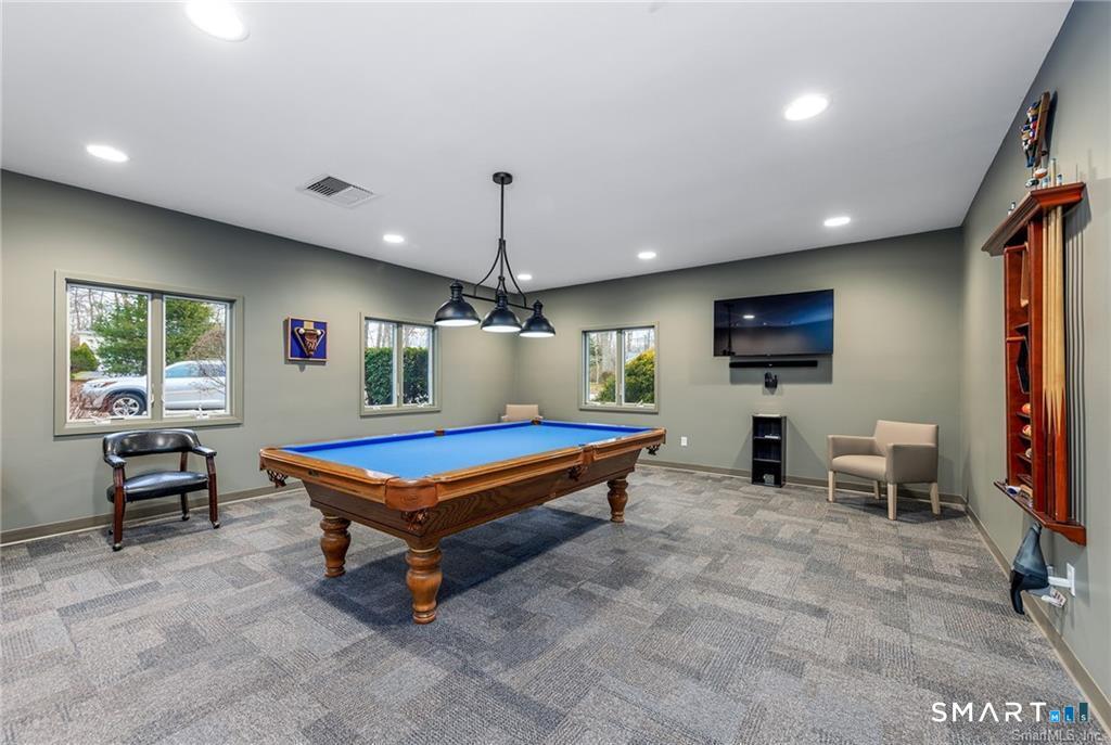 25 Heather Brook Road Montville, CT 06382 - Photo 34 of 39 a room with furniture pool table flat screen tv and windows