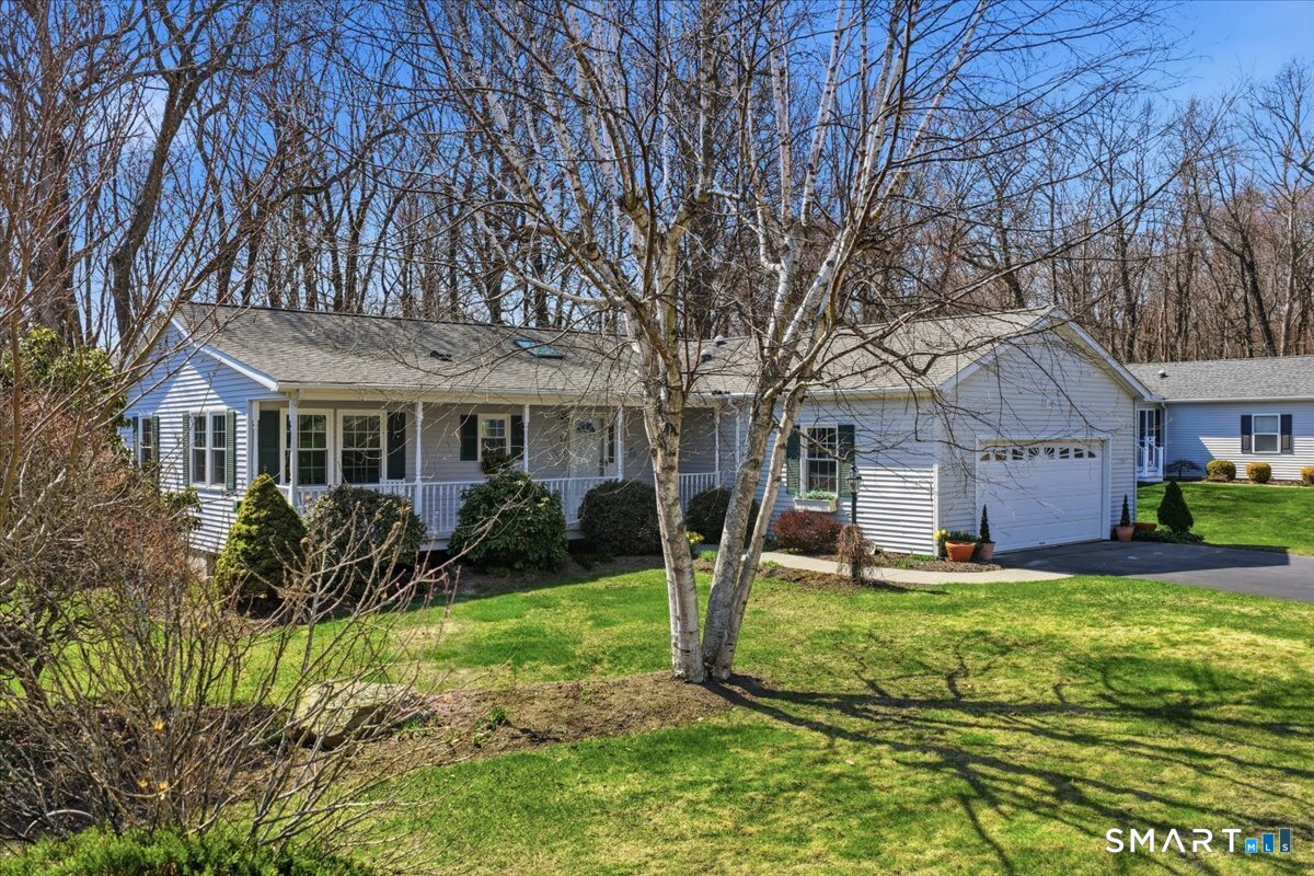 25 Heather Brook Road Montville, CT 06382 - Photo 4 of 39 a front view of house with yard and green space