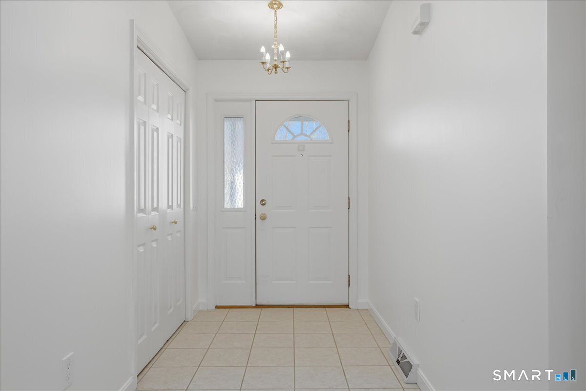 25 Heather Brook Road Montville, CT 06382 - Photo 5 of 39 wooden floor in an empty room with a bathroom