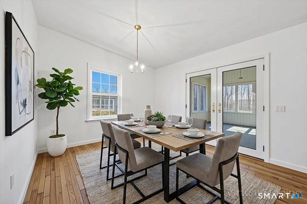 25 Heather Brook Road Montville, CT 06382 - Photo 6 of 39 a view of a dining room with furniture window and wooden floor