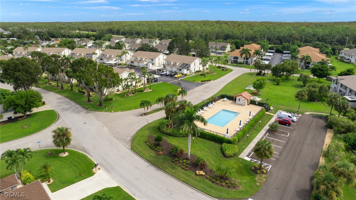 6891 Pentland Way, Unit 91 Fort Myers, FL 33966 - Photo 25 of 33 an aerial view of a house with a garden