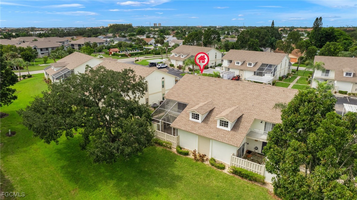 6891 Pentland Way, Unit 91 Fort Myers, FL 33966 - Photo 26 of 33 an aerial view of a house with a garden