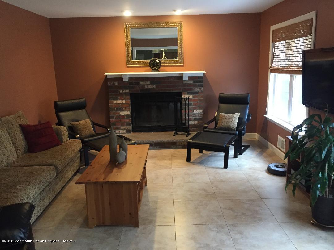 268 Ueland Road Red Bank, NJ 07701 - Photo 23 of 52 Family Rm with Wood Burning FP