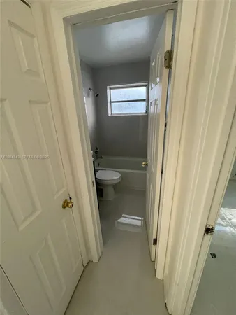 a bathroom with a sink and toilet