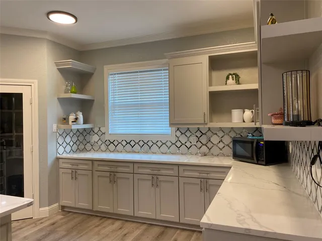 a bathroom with a double vanity sink and a bathtub