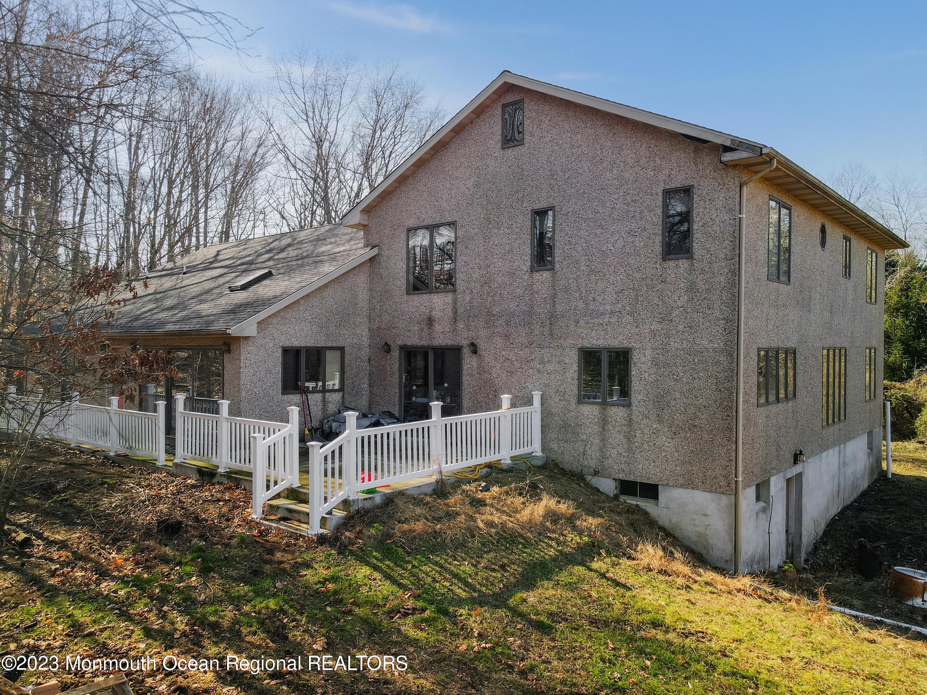 25 Meirs Road Cream Ridge, NJ 08514 - Photo 3 of 17 a front view of a house with a yard