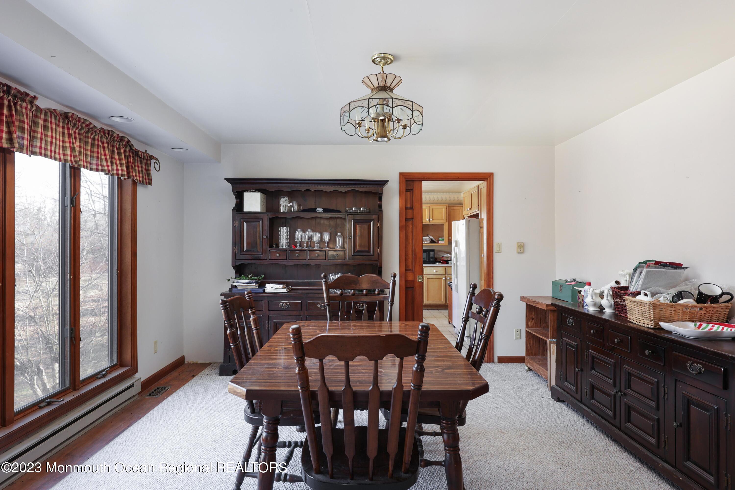 25 Meirs Road Cream Ridge, NJ 08514 - Photo 8 of 17 a view of a dining room with furniture window and outside view