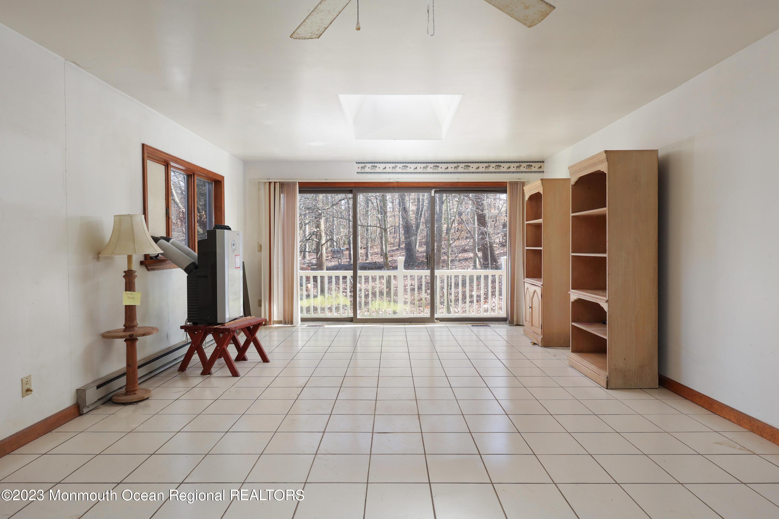 25 Meirs Road Cream Ridge, NJ 08514 - Photo 10 of 17 a view of a livingroom with furniture and a large window