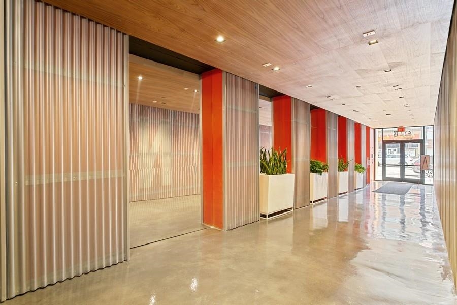 477 Broadway, Unit 409 Bayonne, NJ 07002 - Photo 5 of 19 a view of an empty room with a window