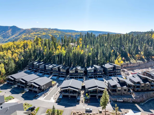 a view of a town with sitting area