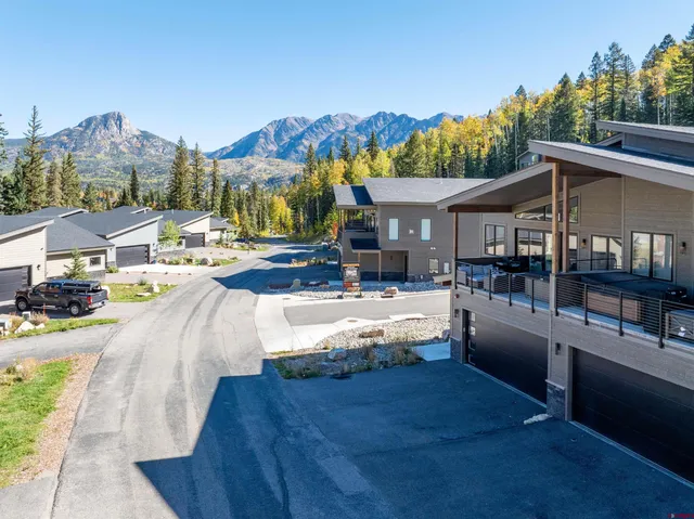 a view of a building with sitting area