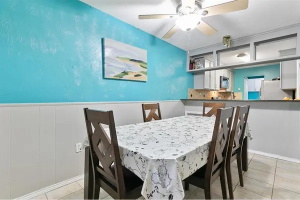 a view of a dining room with furniture