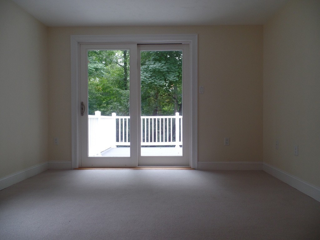 234 Stonebridge Road Wayland, MA 01778 - Photo 13 of 20 a view of empty room with a balcony