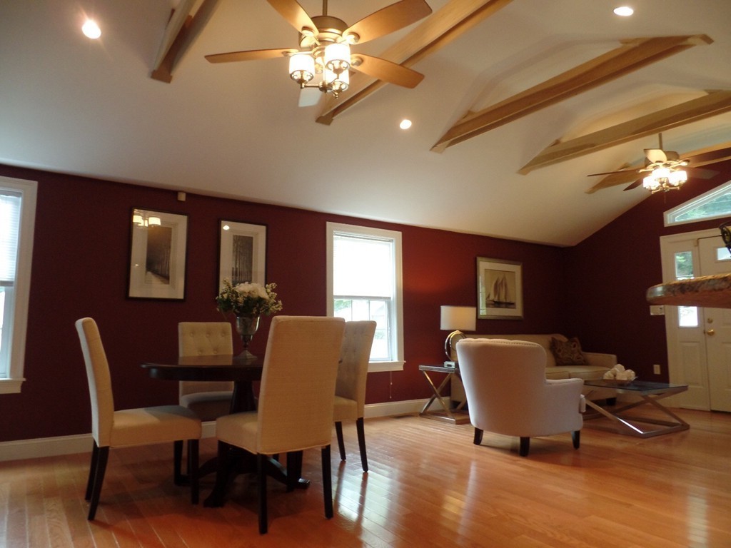 234 Stonebridge Road Wayland, MA 01778 - Photo 7 of 20 a view of a dining room with furniture window and wooden floor