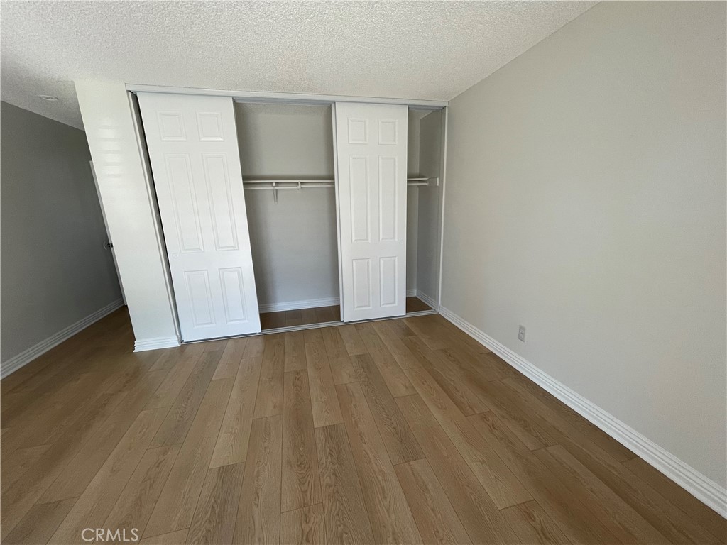 601 Hunter Street Oceanside, CA 92058 - Photo 14 of 14 an empty room with a wooden door