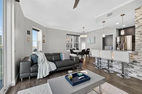 a living room with furniture and a table