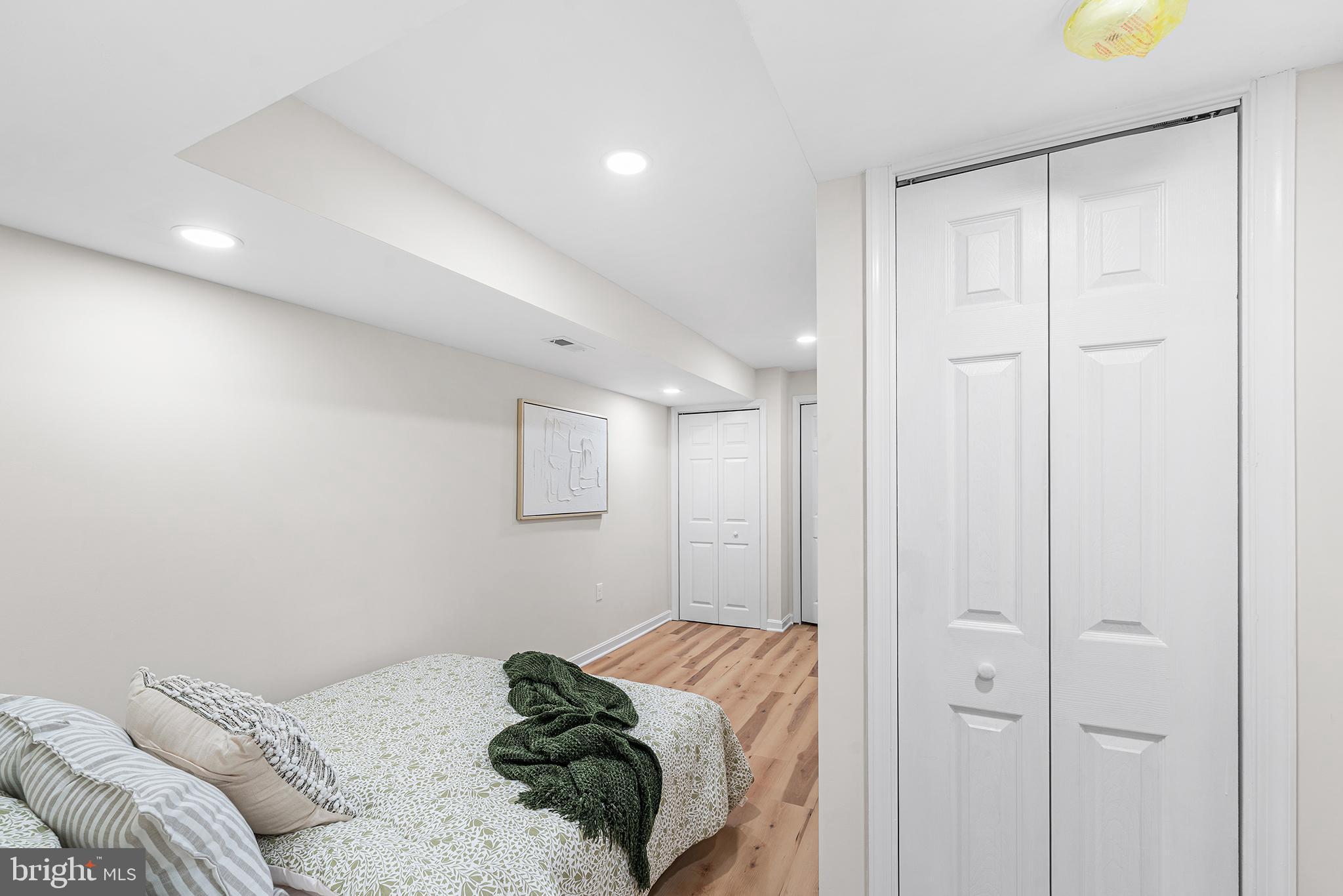 621 West 33rd Street Baltimore, MD 21211 - Photo 19 of 27 a bedroom with a bed and a window