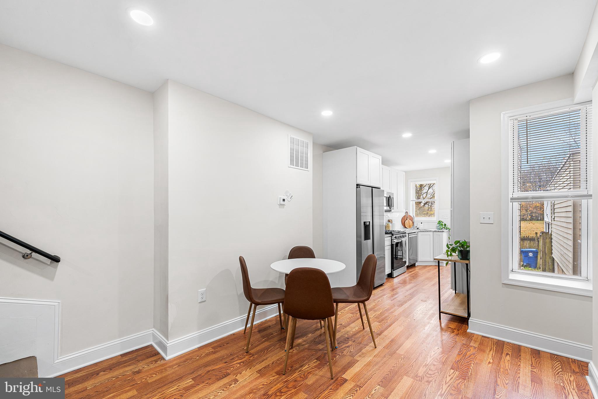 621 West 33rd Street Baltimore, MD 21211 - Photo 5 of 27 a living room with furniture and a wooden floor