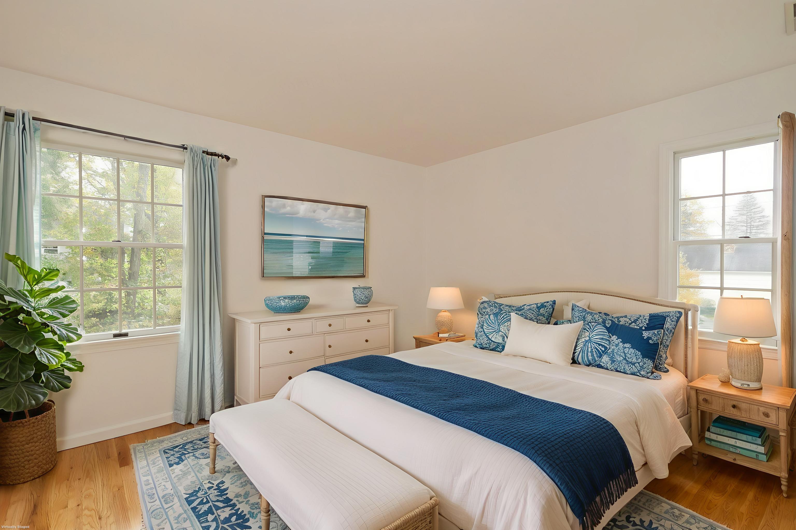 44 Deer Run Road Fairfield, CT 06824 - Photo 13 of 40 a bedroom with a bed and a potted plant