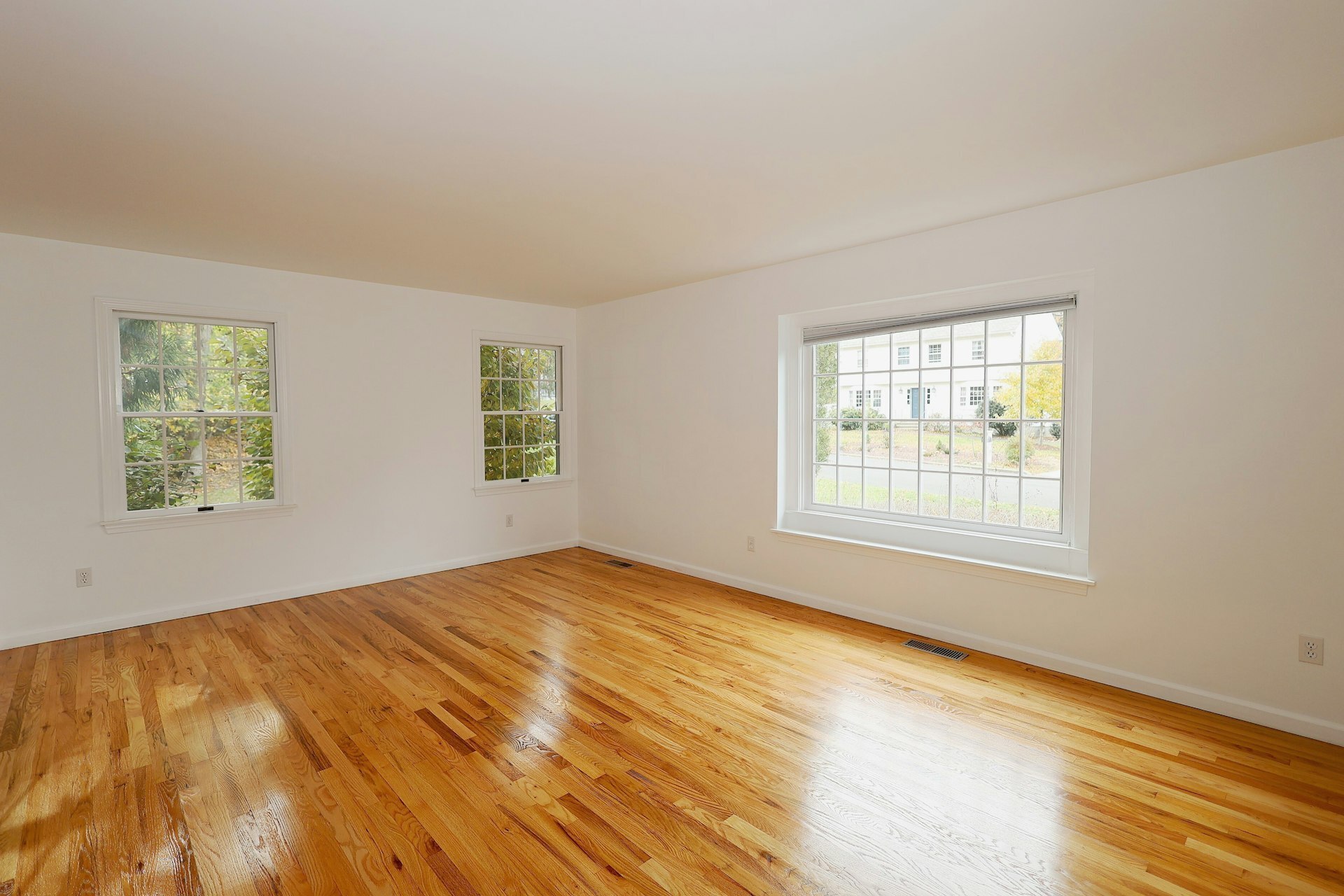 44 Deer Run Road Fairfield, CT 06824 - Photo 25 of 40 a view of an empty room with wooden floor and a window