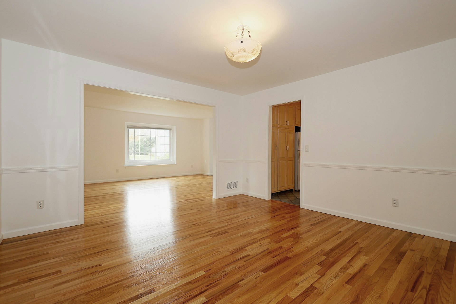 44 Deer Run Road Fairfield, CT 06824 - Photo 26 of 40 an empty room with wooden floor and windows