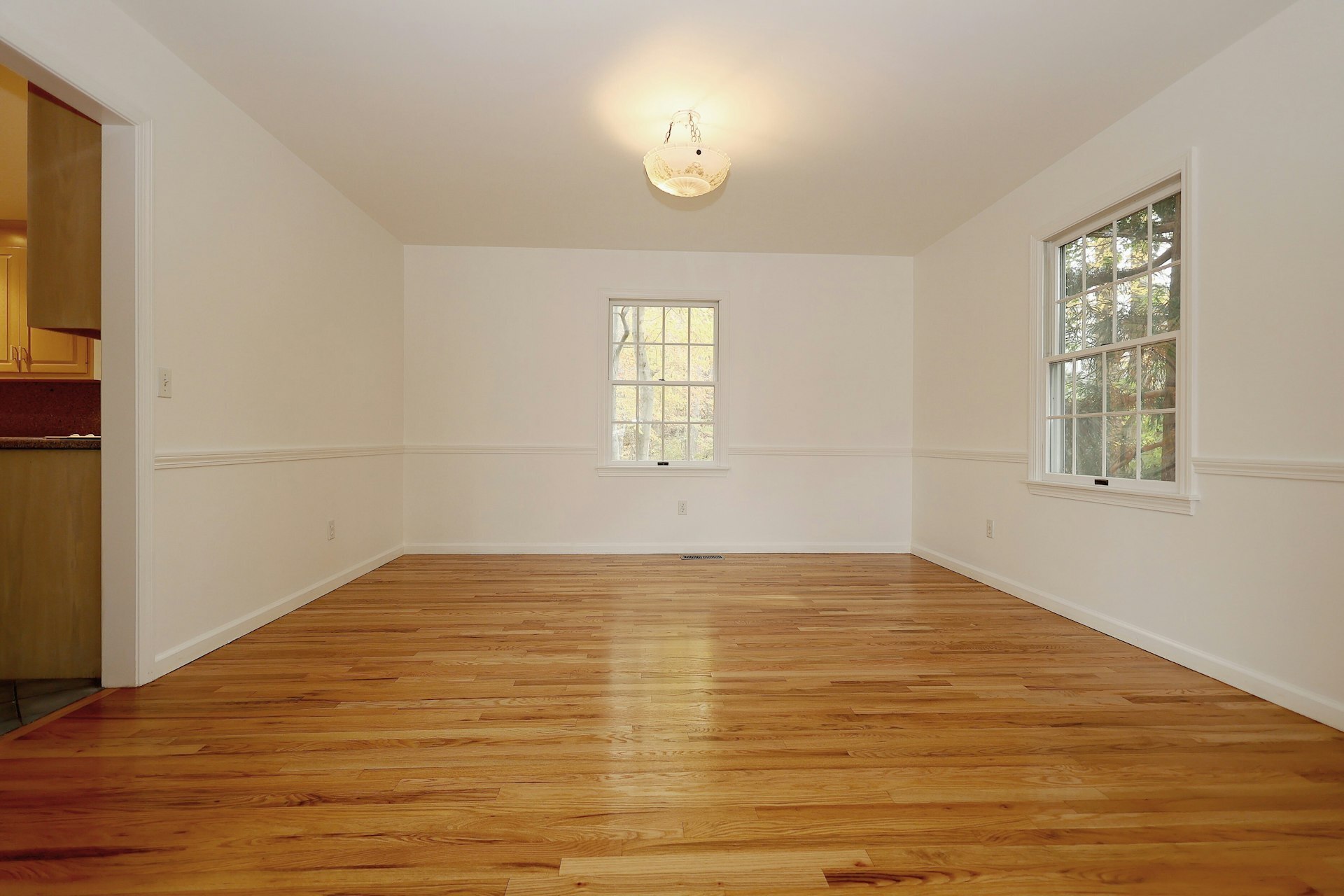 44 Deer Run Road Fairfield, CT 06824 - Photo 27 of 40 a view of an empty room with wooden floor and a window
