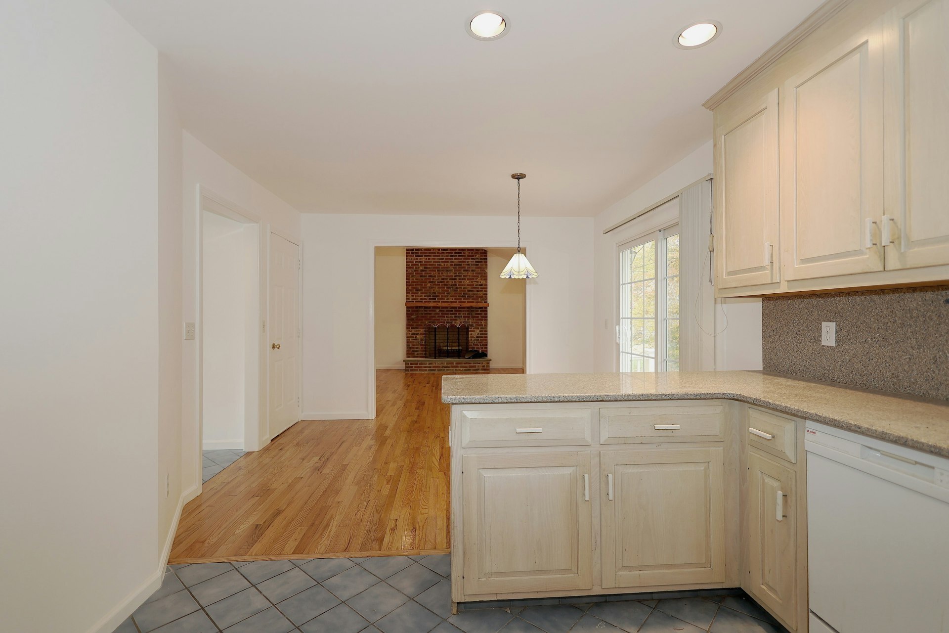 44 Deer Run Road Fairfield, CT 06824 - Photo 30 of 40 a kitchen with granite countertop white cabinets and white appliances